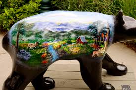 bear statue with painting on side